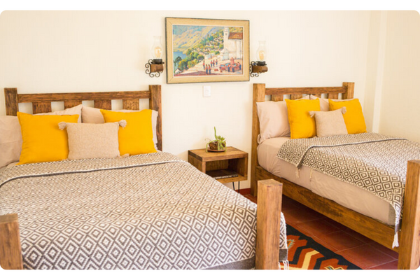 A shared bedroom at Casa Lyobaa